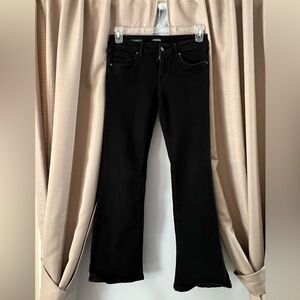 Low-mid rise black stretch flare jeans